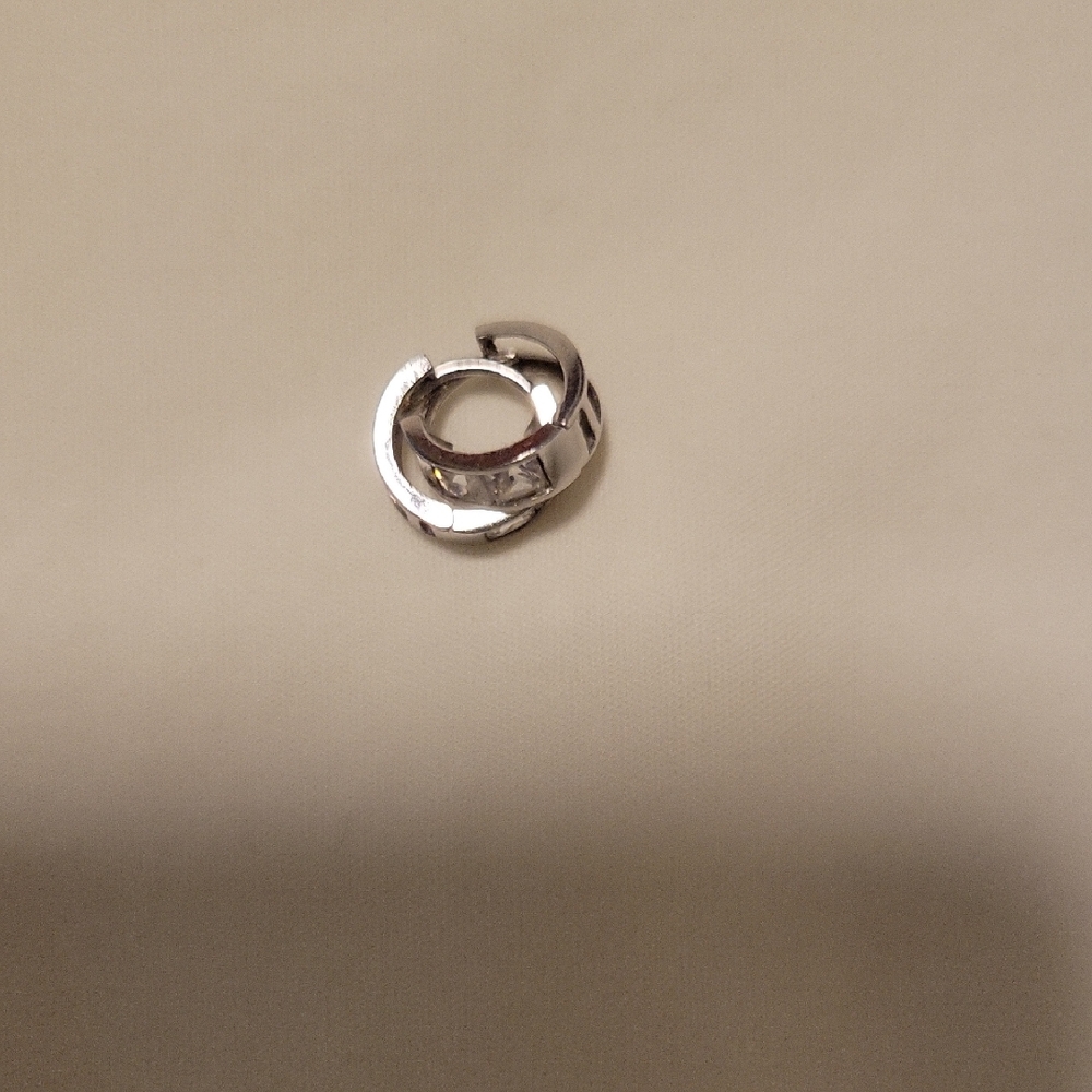 14K white gold hoop earrings with cubic zirconia.